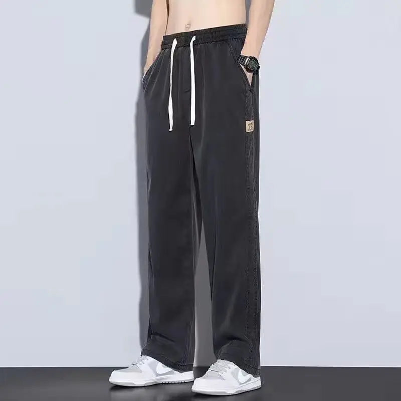  View details for Summer Men’s Ice Silk Jeans – lightweight, breathable denim for hot weather comfort