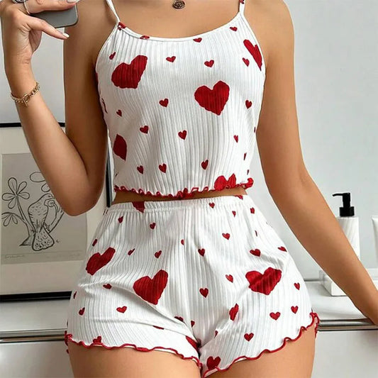 Women's Pajamas Set - Soft Pajama Set with red heart print on white fabric, featuring a sleeveless top and matching shorts for cozy lounging.